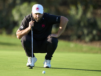 Jon Rahm of Spain studies his shot on the 10th green on day one of the Estrella Damm N.A. Andalucia Masters 2024 at Real Club de Golf Sotogr...