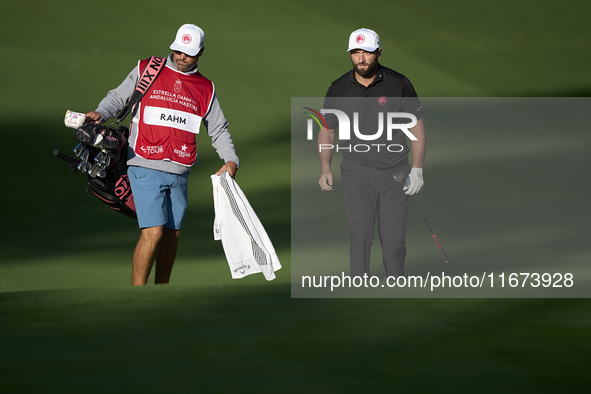 Jon Rahm of Spain walks with his caddie on day one of the Estrella Damm N.A. Andalucia Masters 2024 at Real Club de Golf Sotogrande in San R...