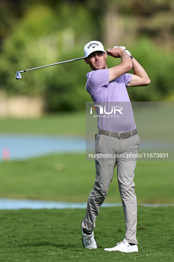 Jordan Gumberg of the USA plays his second shot on the 14th hole on day one of the Estrella Damm N.A. Andalucia Masters 2024 at Real Club de...