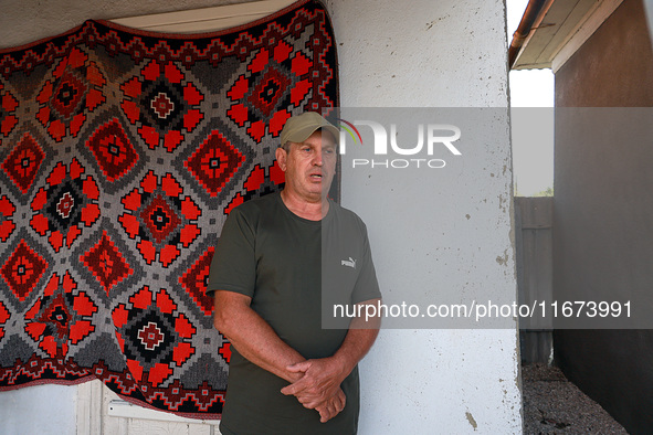 Local Fedir Shestiuk, whose neighboring house is destroyed by a Russian drone attack, is in Vylkove, Odesa region, southern Ukraine, on Octo...