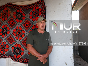 Local Fedir Shestiuk, whose neighboring house is destroyed by a Russian drone attack, is in Vylkove, Odesa region, southern Ukraine, on Octo...