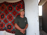 Local Fedir Shestiuk, whose neighboring house is destroyed by a Russian drone attack, is in Vylkove, Odesa region, southern Ukraine, on Octo...