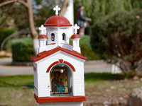 A scale model of a church is near the Delta hotel and restaurant damaged by a Russian drone attack in Vylkove, Ukraine, on October 11, 2024....