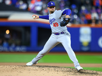 Los Angeles Dodgers relief pitcher Blake Treinen #49 throws during the eighth inning in Game 3 of the baseball NL Championship Series agains...