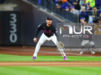 New York Mets first baseman Pete Alonso #20 prepares during the first inning in Game 3 of the baseball NL Championship Series against the Lo...