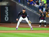 New York Mets first baseman Pete Alonso #20 prepares during the first inning in Game 3 of the baseball NL Championship Series against the Lo...