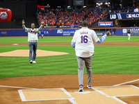 New York Mets Hall of Famer and 1986 World Series Champion Darryl Strawberry throws out the ceremonial first pitch to former teammate, fello...