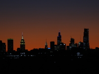 A sunset appears while looking towards Manhattan before Game 3 of a baseball NL Championship Series between the Los Angeles Dodgers and New...