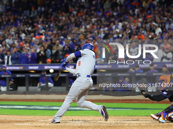 Enrique Hernandez #8 of the Los Angeles Dodgers hits a home run during the sixth inning in Game 3 of the baseball NL Championship Series aga...