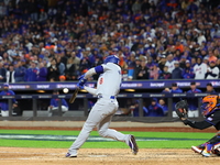 Enrique Hernandez #8 of the Los Angeles Dodgers hits a home run during the sixth inning in Game 3 of the baseball NL Championship Series aga...