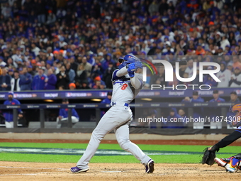 Enrique Hernandez #8 of the Los Angeles Dodgers hits a home run during the sixth inning in Game 3 of the baseball NL Championship Series aga...