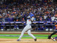 Enrique Hernandez #8 of the Los Angeles Dodgers hits a home run during the sixth inning in Game 3 of the baseball NL Championship Series aga...