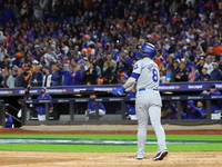 Enrique Hernandez #8 of the Los Angeles Dodgers hits a home run during the sixth inning in Game 3 of the baseball NL Championship Series aga...