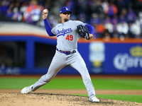 Los Angeles Dodgers relief pitcher Blake Treinen #49 throws during the eighth inning in Game 3 of the baseball NL Championship Series agains...