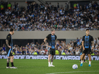 Lionel Messi, Rodrigo de Paul, and Lautaro Martinez of Argentina warm up before the FIFA World Cup 2026 Qualifier match between Argentina an...