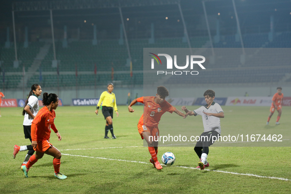 Players from India and Pakistan compete in the first-round match of the SAFF Women's Championship 2024 in Kathmandu, Nepal, on October 17, 2...