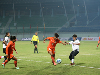 Players from India and Pakistan compete in the first-round match of the SAFF Women's Championship 2024 in Kathmandu, Nepal, on October 17, 2...