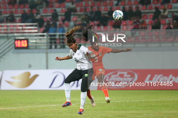 Players from India and Pakistan compete in the first-round match of the SAFF Women's Championship 2024 in Kathmandu, Nepal, on October 17, 2...