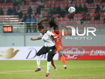 Players from India and Pakistan compete in the first-round match of the SAFF Women's Championship 2024 in Kathmandu, Nepal, on October 17, 2...