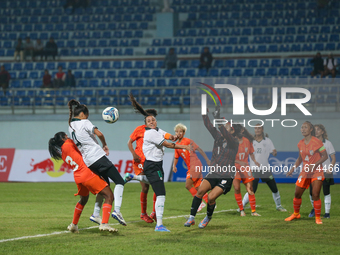 Players from India and Pakistan compete in the first-round match of the SAFF Women's Championship 2024 in Kathmandu, Nepal, on October 17, 2...