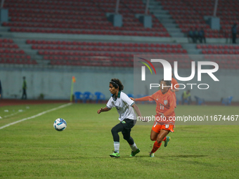 Players from India and Pakistan compete in the first-round match of the SAFF Women's Championship 2024 in Kathmandu, Nepal, on October 17, 2...