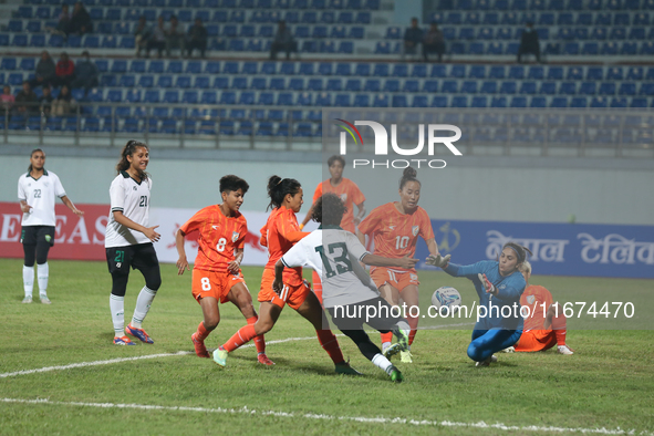 Players from India and Pakistan compete in the first-round match of the SAFF Women's Championship 2024 in Kathmandu, Nepal, on October 17, 2...