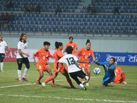 Players from India and Pakistan compete in the first-round match of the SAFF Women's Championship 2024 in Kathmandu, Nepal, on October 17, 2...