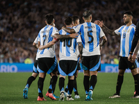 Lionel Messi of Argentina celebrates with his teammates after scoring the fifth goal of his team during the FIFA World Cup 2026 Qualifier ma...