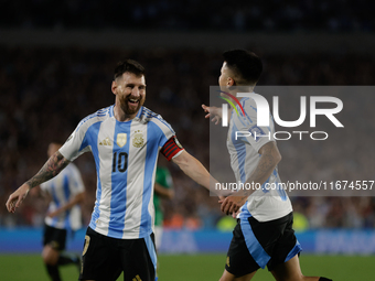 Lionel Messi and Thiago Almada of Argentina celebrate after scoring the fifth goal of their team during the FIFA World Cup 2026 Qualifier ma...