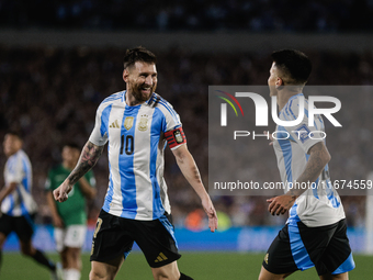 Lionel Messi and Thiago Almada of Argentina celebrate after scoring the fifth goal of their team during the FIFA World Cup 2026 Qualifier ma...