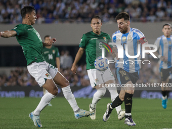 Lionel Messi of Argentina and Jose Sagredo of Bolivia are in action during the FIFA World Cup 2026 Qualifier match between Argentina and Bol...