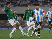 Lionel Messi of Argentina and Jose Sagredo of Bolivia are in action during the FIFA World Cup 2026 Qualifier match between Argentina and Bol...