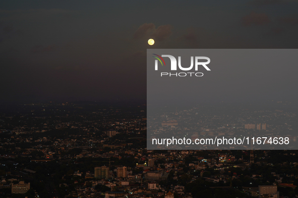 Hunter's Supermoon appears over the city of Colombo, Sri Lanka, on October 17, 2024. October's full moon is known as the Hunter's Moon becau...