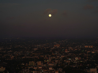 Hunter's Supermoon appears over the city of Colombo, Sri Lanka, on October 17, 2024. October's full moon is known as the Hunter's Moon becau...