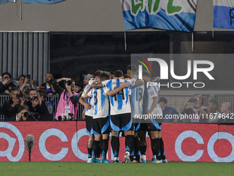 Lionel Messi of Argentina celebrates with his teammates after scoring the first goal of his team during the FIFA World Cup 2026 Qualifier ma...