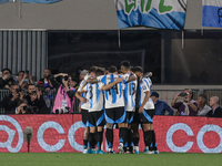 Lionel Messi of Argentina celebrates with his teammates after scoring the first goal of his team during the FIFA World Cup 2026 Qualifier ma...