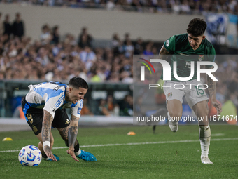 Enzo Fernandez of Argentina and Gabriel Villamil of Bolivia are in action during the FIFA World Cup 2026 Qualifier match between Argentina a...