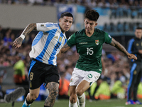 Enzo Fernandez of Argentina and Gabriel Villamil of Bolivia are in action during the FIFA World Cup 2026 Qualifier match between Argentina a...