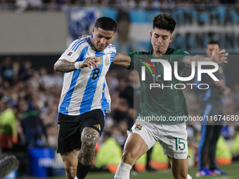 Enzo Fernandez of Argentina and Gabriel Villamil of Bolivia are in action during the FIFA World Cup 2026 Qualifier match between Argentina a...