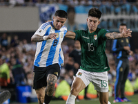 Enzo Fernandez of Argentina and Gabriel Villamil of Bolivia are in action during the FIFA World Cup 2026 Qualifier match between Argentina a...