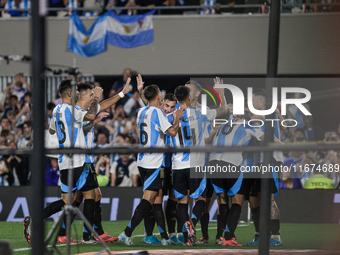 Lionel Messi of Argentina celebrates with his teammates after scoring the sixth goal of his team during the FIFA World Cup 2026 Qualifier ma...