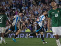 Lionel Messi and Enzo Fernandez of Argentina celebrate after scoring the sixth goal of their team during the FIFA World Cup 2026 Qualifier m...