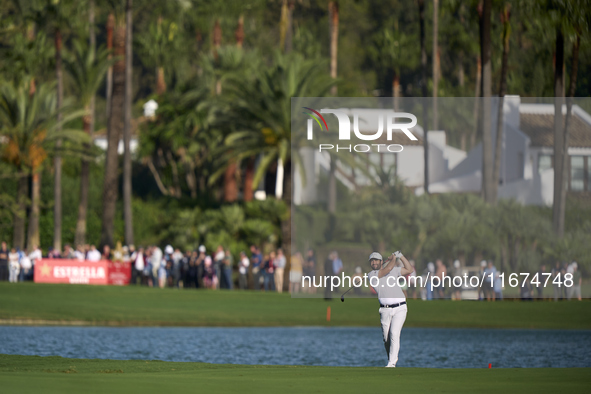 Adrian Otaegui of Spain plays his second shot on the 14th hole on day one of the Estrella Damm N.A. Andalucia Masters 2024 at Real Club de G...