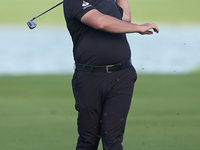 Jon Rahm of Spain plays his second shot on the 14th hole on day one of the Estrella Damm N.A. Andalucia Masters 2024 at Real Club de Golf So...