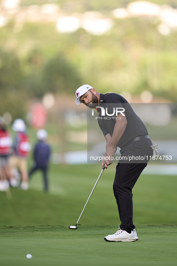 Jon Rahm of Spain plays a shot on the 14th green on day one of the Estrella Damm N.A. Andalucia Masters 2024 at Real Club de Golf Sotogrande...