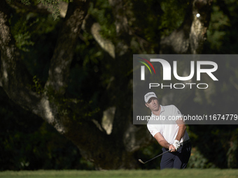 Julien Guerrier of France approaches his ball on the 14th green on day one of the Estrella Damm N.A. Andalucia Masters 2024 at Real Club de...