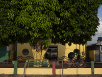 People ride bicycles on the streets of Afua, a city located at the mouth of the Amazon River, where it is forbidden to drive any type of mot...