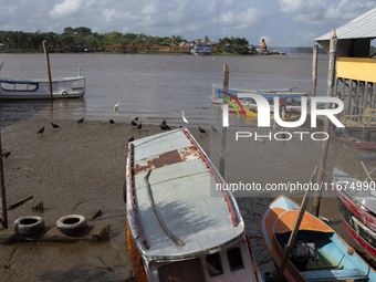 The Afua waterfront with boats during low tide in Afua, Para, Brazil, on September 29, 2024. (