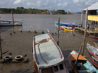 The Afua waterfront with boats during low tide in Afua, Para, Brazil, on September 29, 2024. (