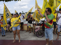 Supporters of Afua mayoral candidate Sandro Cunha walk in Afua, Para, Brazil, on September 29, 2024. (